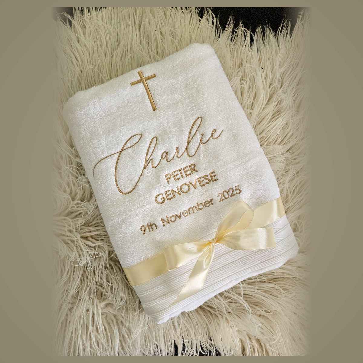 White personalised christening towel with gold name, date and cross tied with cream ribbon - baptism towel