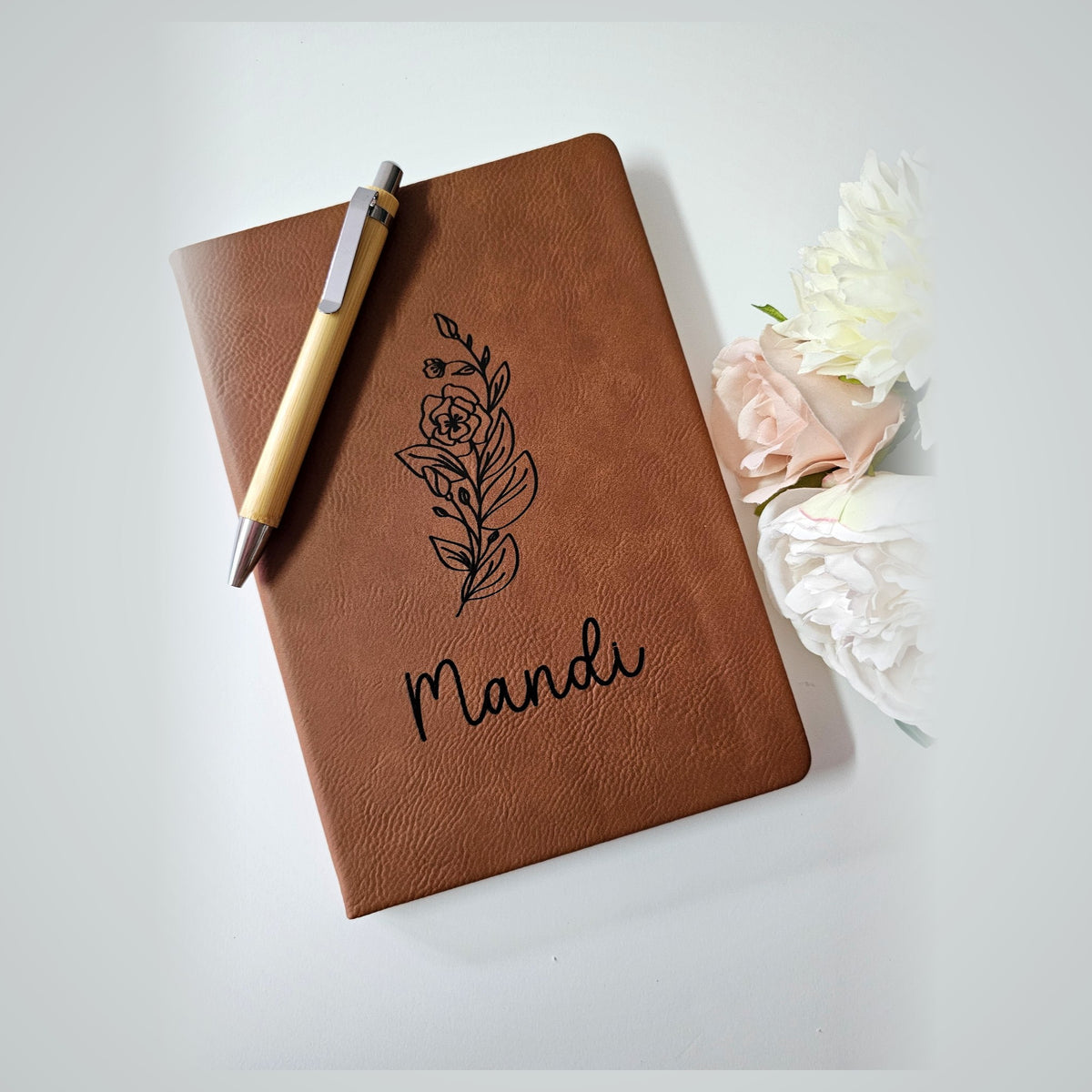 Brown A5 leather journal engraved with name and botanical leaf design - personalised notebook gift