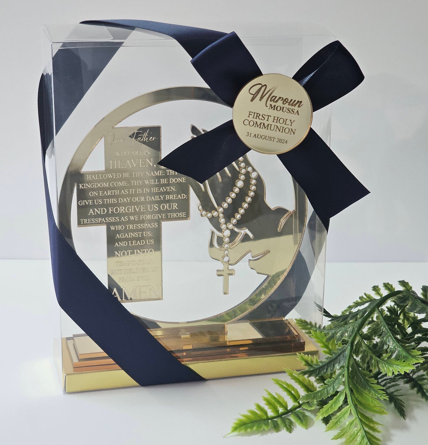 old acrylic cross with engraved Lord’s Prayer and rosary hands, boxed with navy ribbon and personalised tag for Communion, Baptism, or Confirmation.