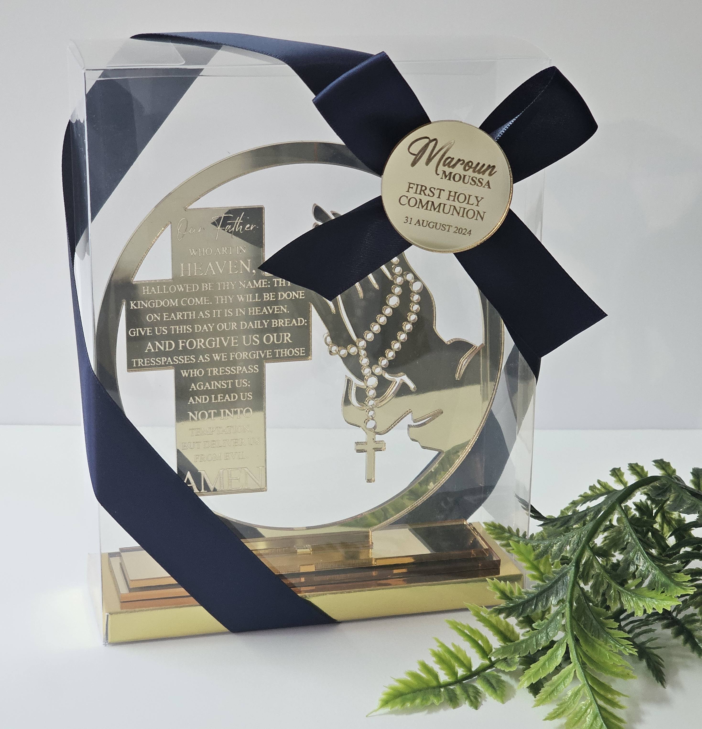 old acrylic cross with engraved Lord’s Prayer and rosary hands, boxed with navy ribbon and personalised tag for Communion, Baptism, or Confirmation.