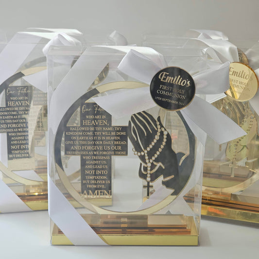 old acrylic cross with engraved Lord’s Prayer and rosary hands, boxed with white ribbon and personalised tag for Communion, Baptism, or Confirmation.