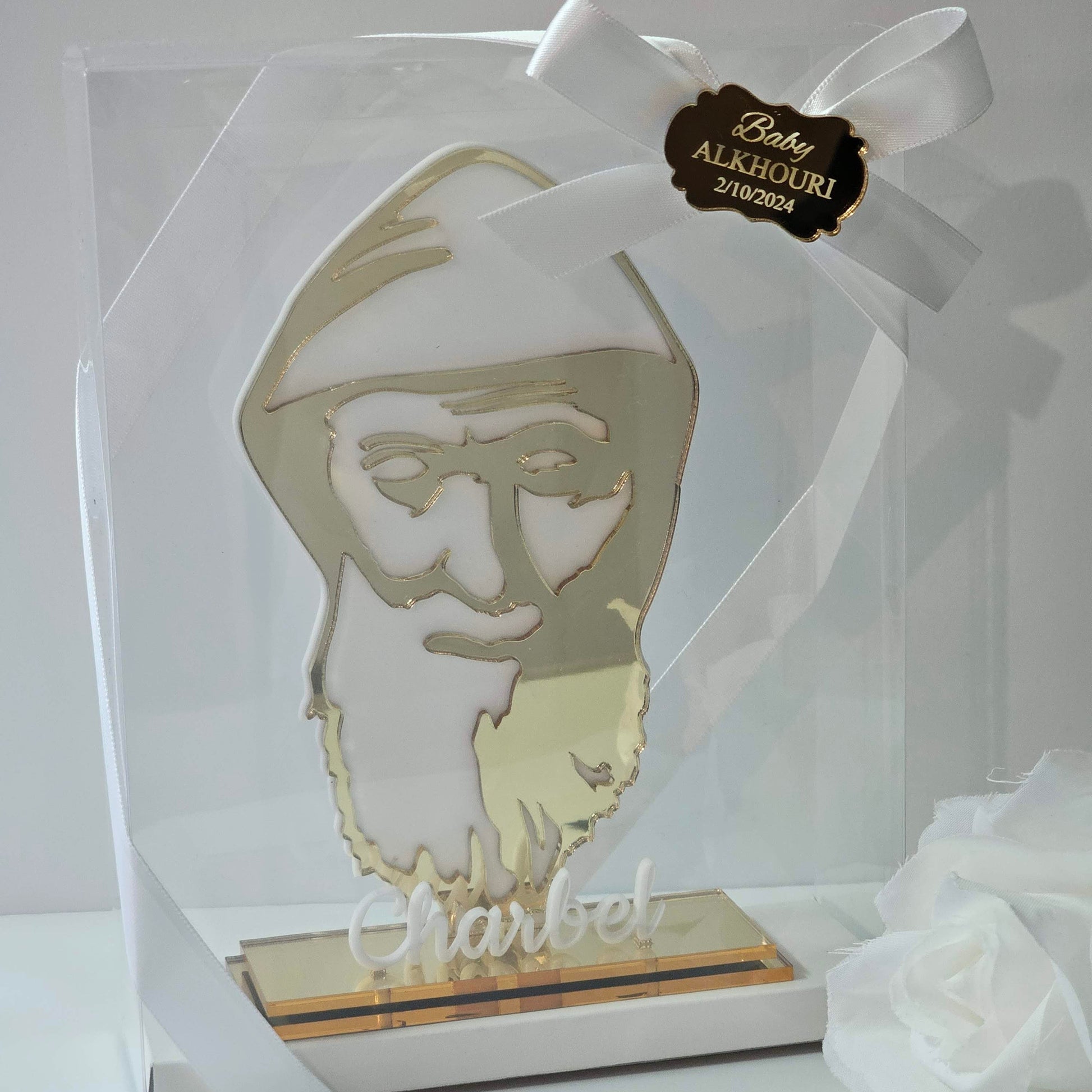 Acrylic bomboniere featuring a stylised St Charbel silhouette on a freestanding base with personalised with box ribbon and tag