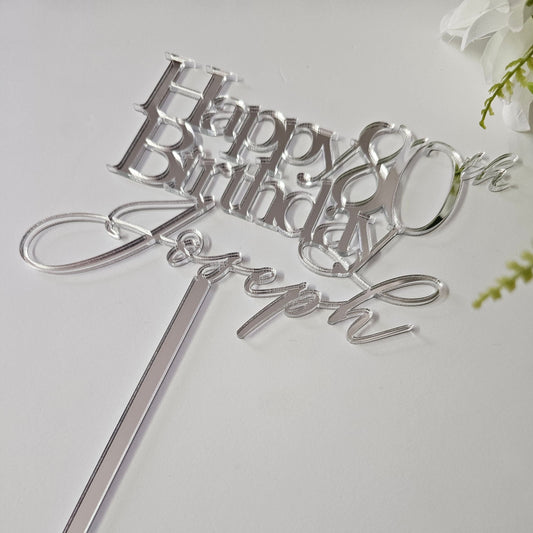 Elegant personalized milestone birthday cake topper with a custom name and age in a stylish script design.