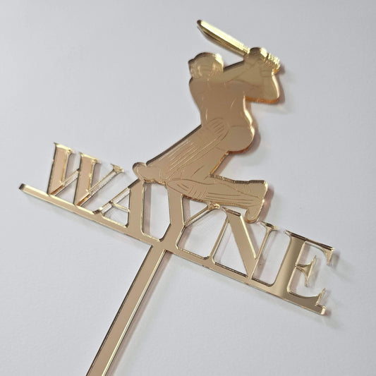 Cricket-themed personalized cake topper with a batsman silhouette and a custom name design.