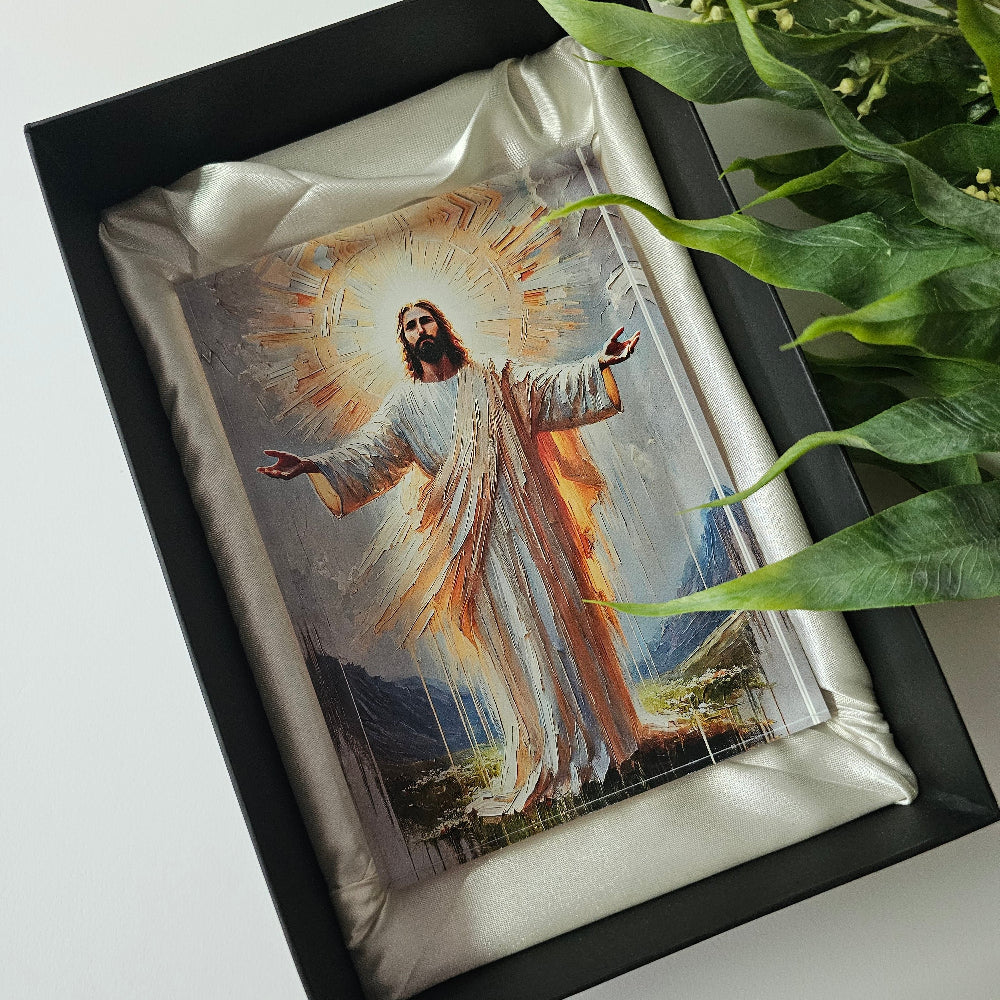 UV printed 20mm clear acrylic block featuring radiant robed figure with outstretched arms and mountain backdrop, boxed for gifting.
