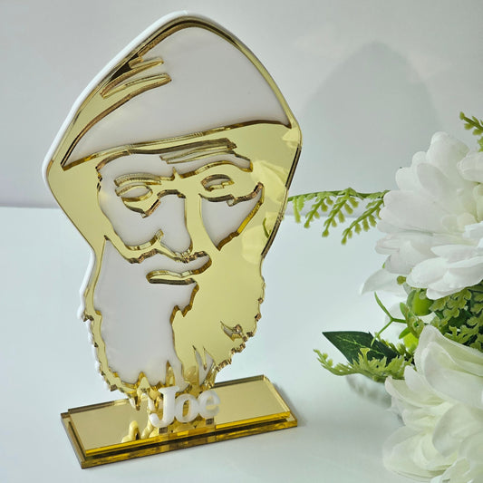 Acrylic bomboniere featuring a stylised St Charbel silhouette on a freestanding base with personalised name.