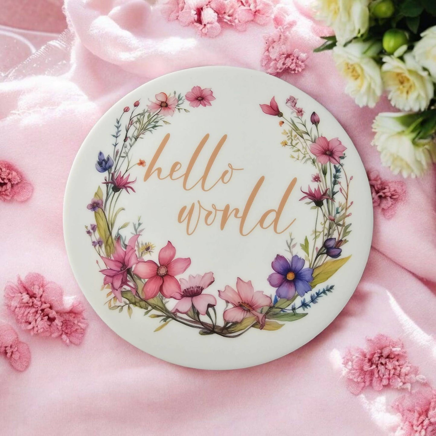 Floral Hello World newborn announcement disc, pink and purple flower design on white acrylic