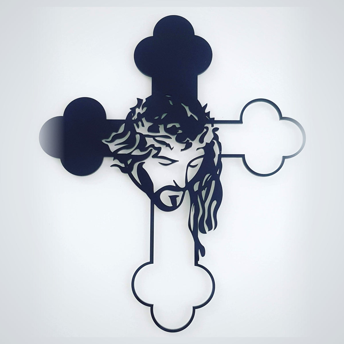 Ornate black acrylic cross with Jesus face and crown of thorns - religious wall art
