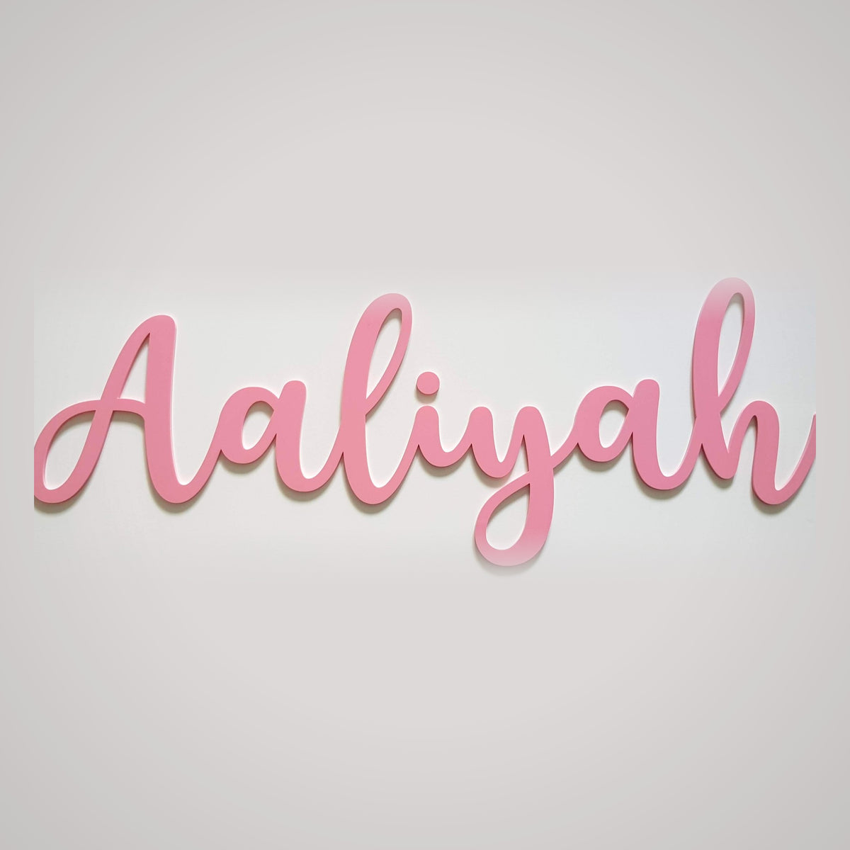 Personalised pink acrylic script name sign laser cut in an elegant font - custom nursery wall name by MKelada Designs