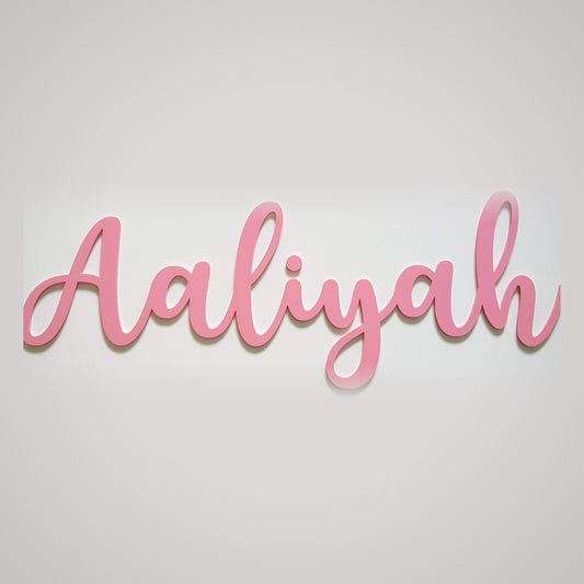 Personalised pink acrylic script name sign laser cut in an elegant font - custom nursery wall name by MKelada Designs