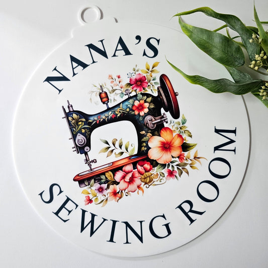 Round white personalised sewing room sign with floral sewing machine print - custom acrylic door sign